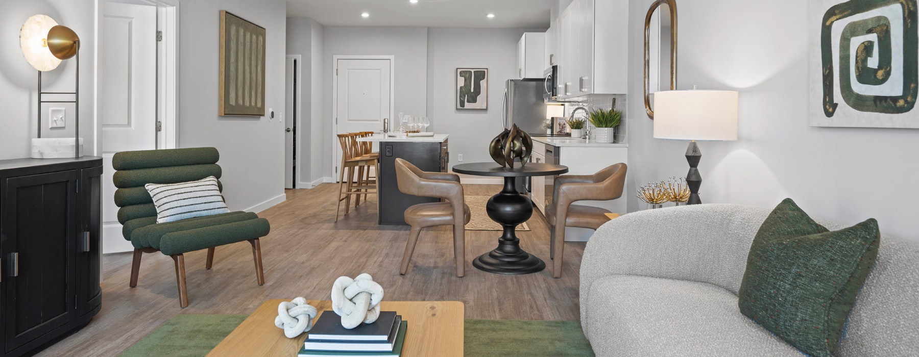living room with couch and green chair