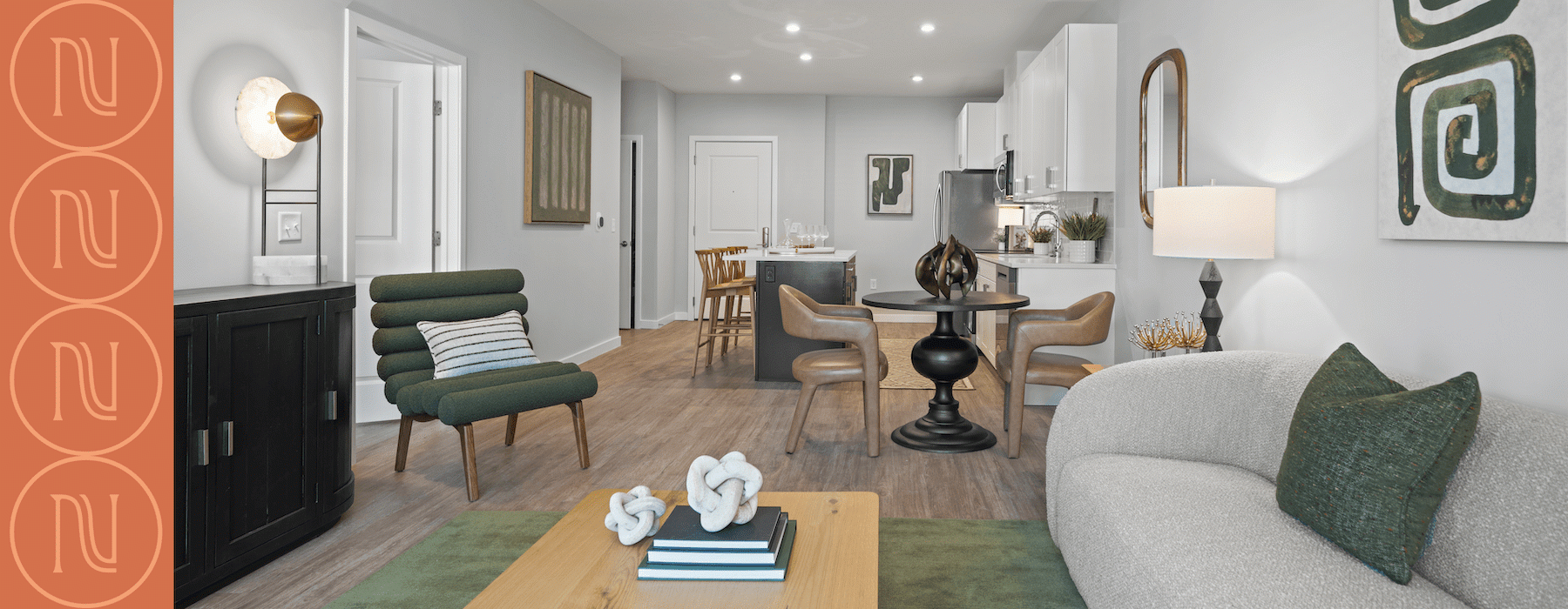 living room with couch and green chair