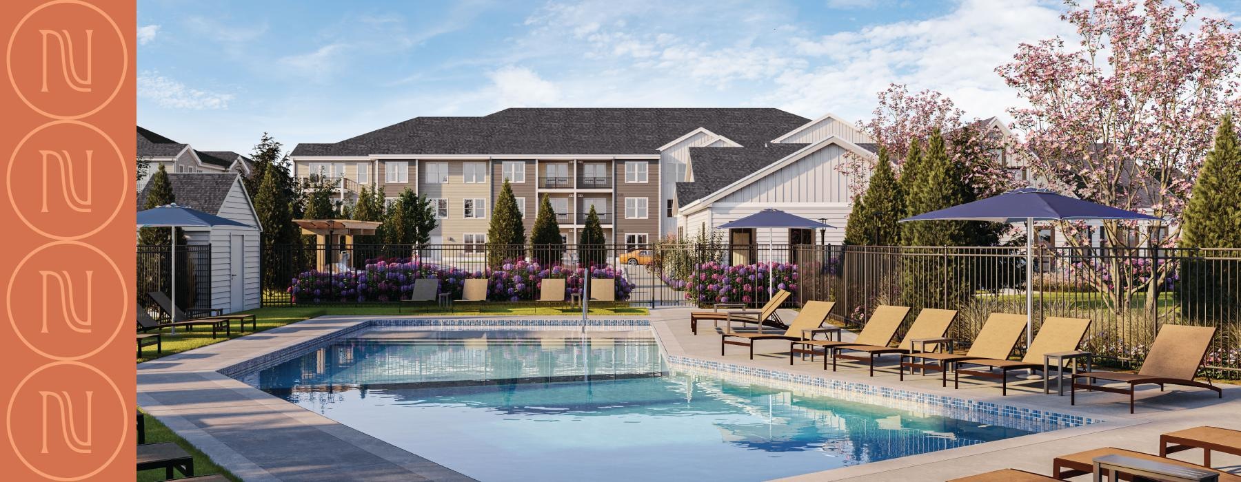 a swimming pool with chairs and umbrellas next to a house